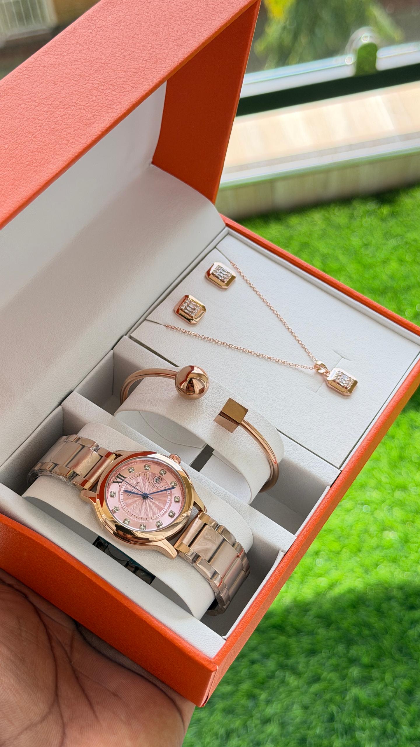 Elegant rose-gold watch presented with jewellery